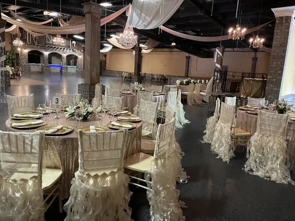 Rose gold ruffled quinceañera dress and elegant venue decorations at La Hacienda Gainesville GA