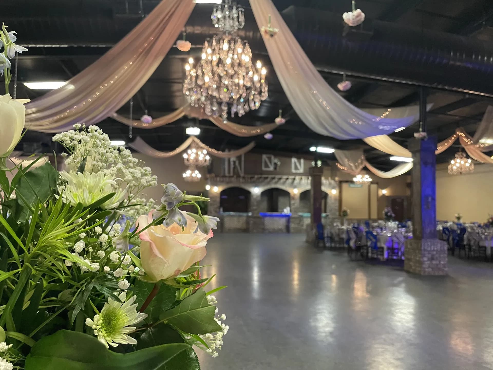 All-inclusive venue ballroom with draping and dance floor La Hacienda