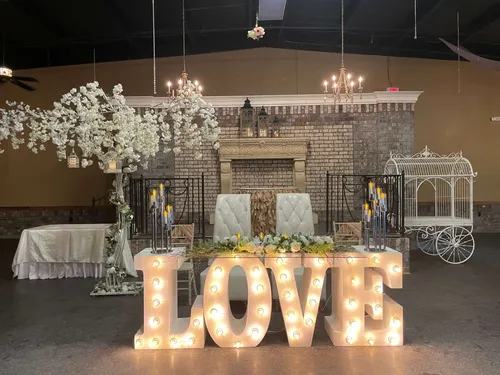 Venue interior love sign floral centerpiece La Hacienda