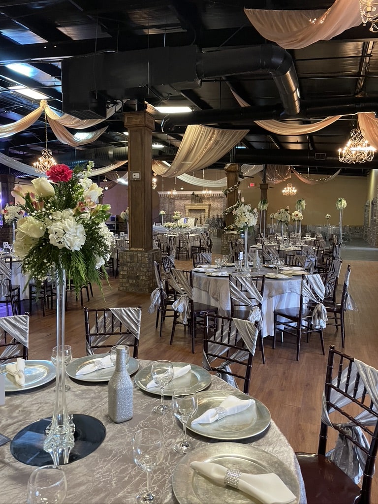 Venue Portrait of newlyweds in archway at venue near Lake Lanier
