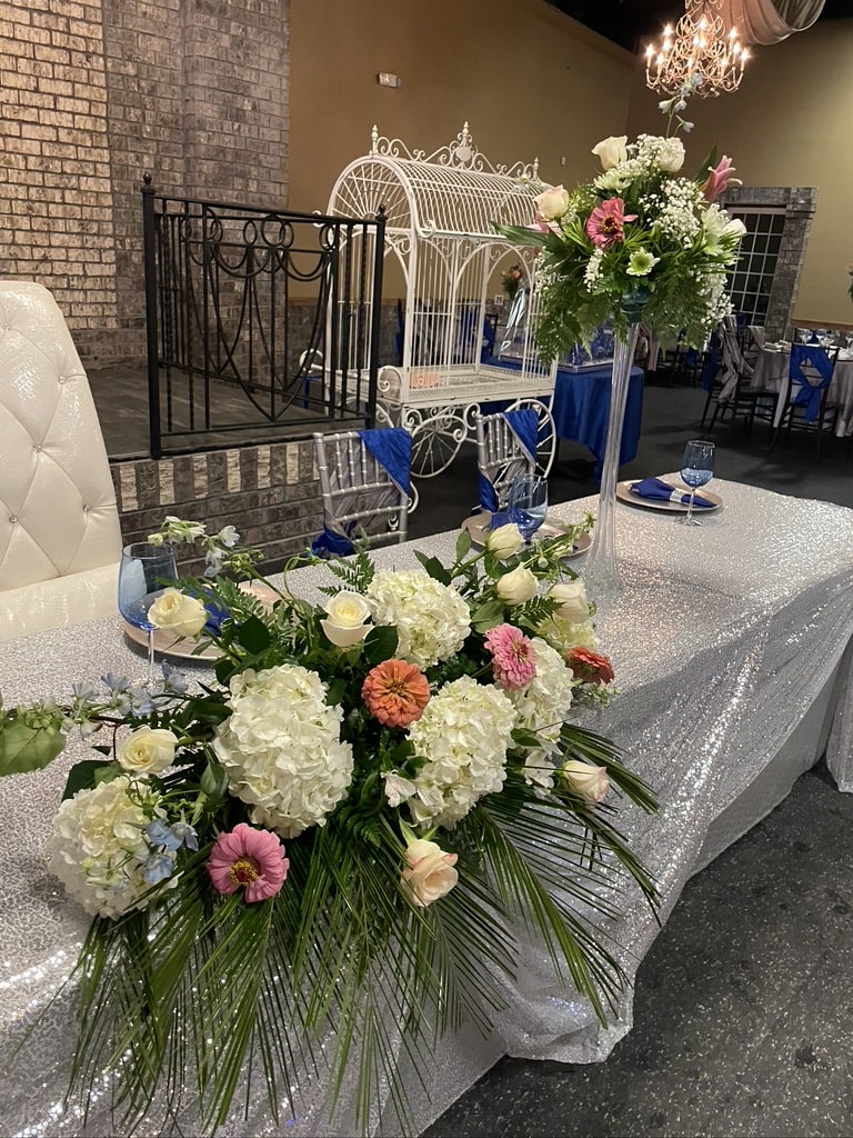 Venue Vertical ceremony image with floral aisle near Lake Lanier