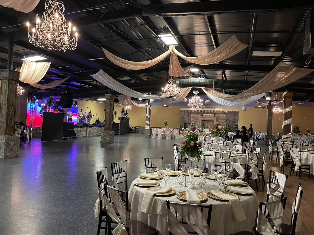 Sweetheart table with floral backdrop